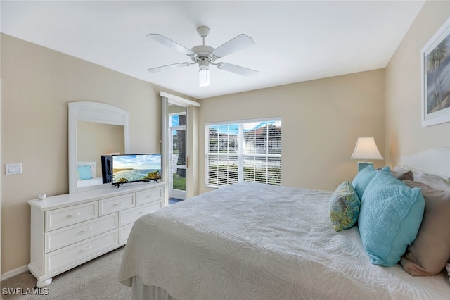 bedroom featuring ceiling fan and light colored carpet