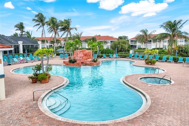 view of swimming pool featuring a patio area