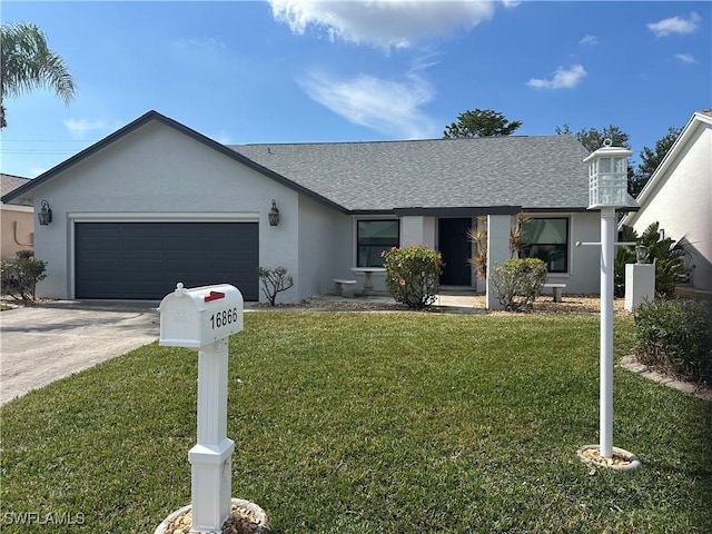 ranch-style home with a garage and a front yard