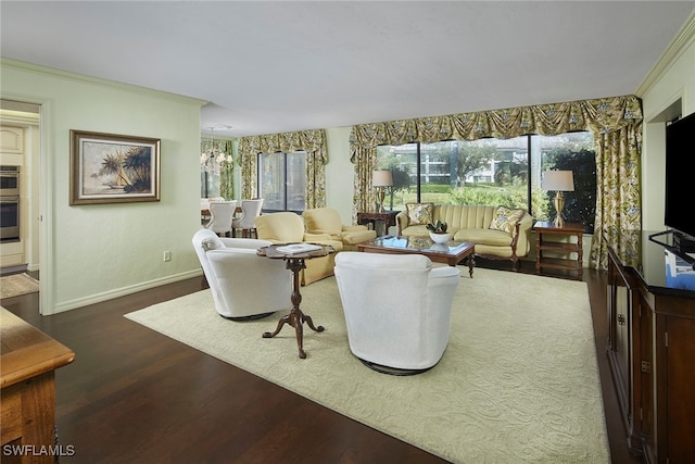 living room featuring ornamental molding and dark hardwood / wood-style floors