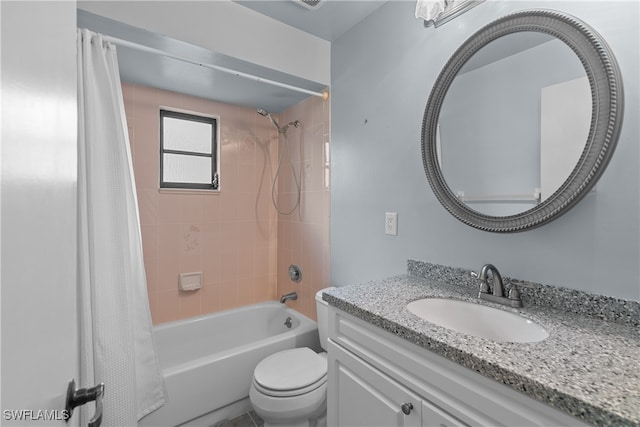 full bathroom featuring vanity, toilet, and shower / bathtub combination with curtain