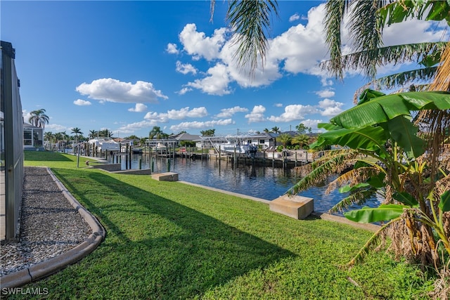 property view of water with a dock