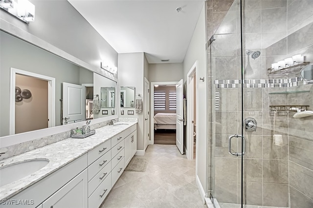 bathroom with walk in shower and vanity