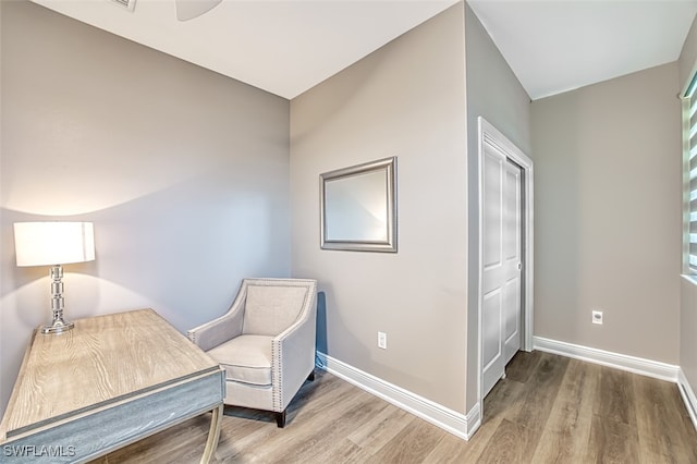 living area featuring hardwood / wood-style floors