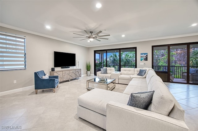 living room with ceiling fan, crown molding, and light tile patterned floors