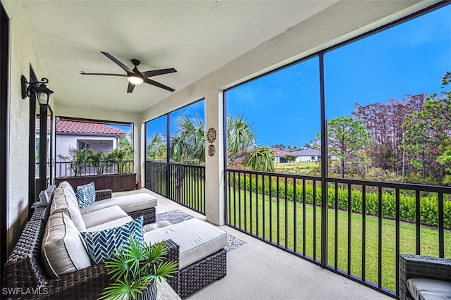 sunroom / solarium with ceiling fan