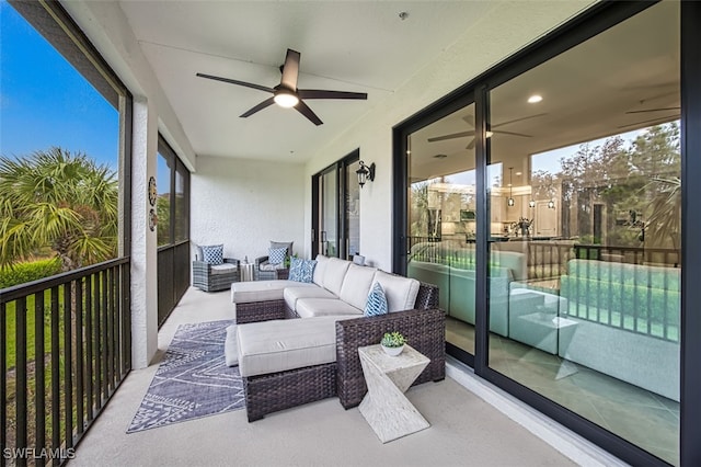 balcony with outdoor lounge area and ceiling fan