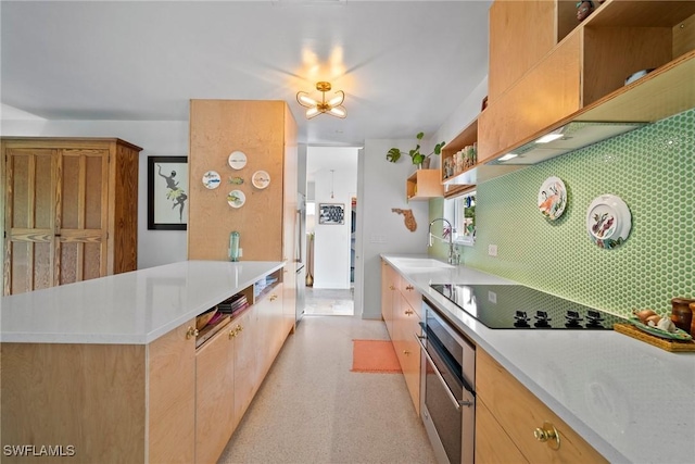 kitchen with tasteful backsplash, open shelves, oven, black electric cooktop, and a sink