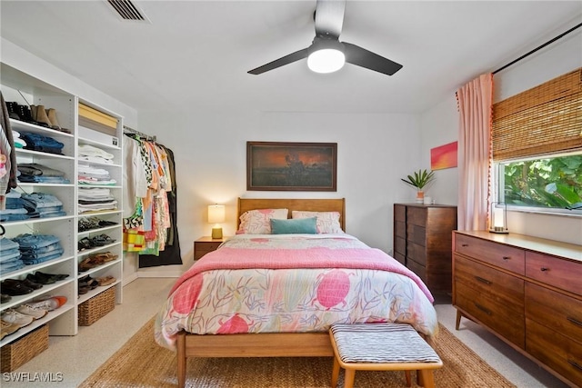 bedroom with visible vents and ceiling fan