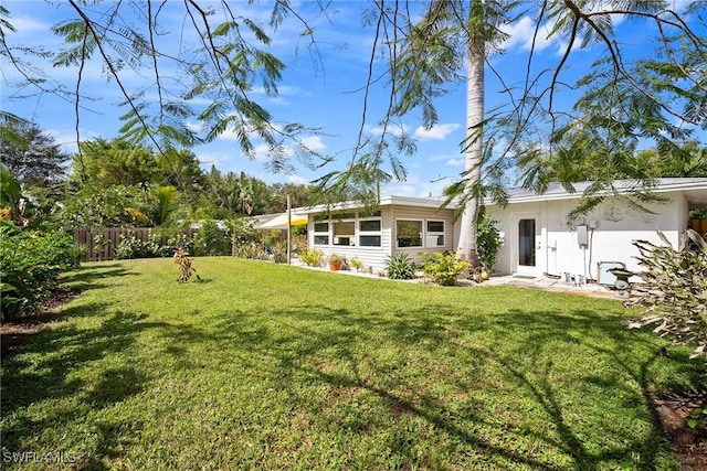 view of yard featuring fence