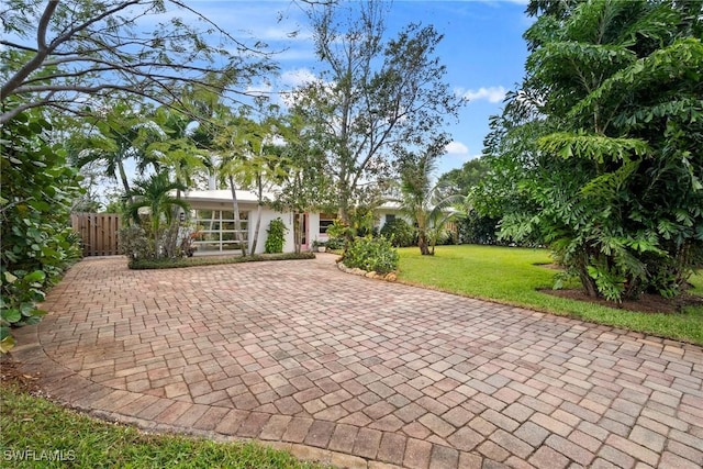 view of patio / terrace featuring fence