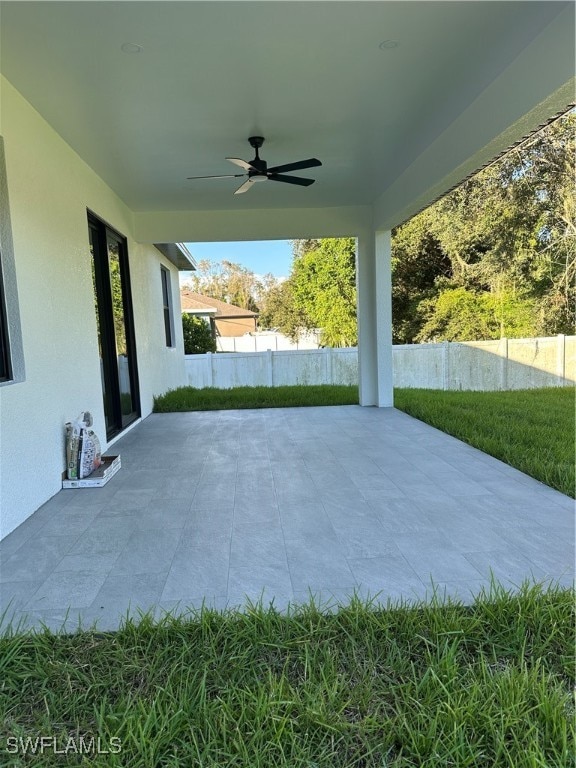 view of patio / terrace featuring ceiling fan