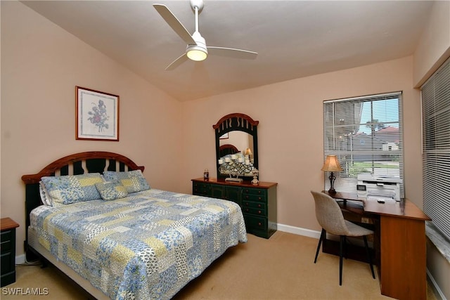 carpeted bedroom featuring ceiling fan and lofted ceiling