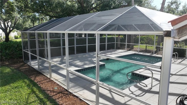 view of pool featuring a patio