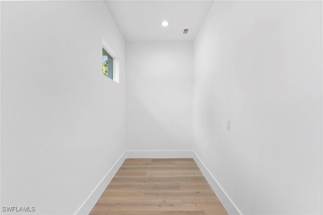 3509 5th Ave SW, Naples, FL 34117 - empty room featuring baseboards, light wood-style flooring, and recessed lighting
