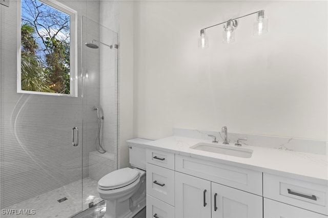 3509 5th Ave SW, Naples, FL 34117 - bathroom featuring a stall shower, toilet, and vanity