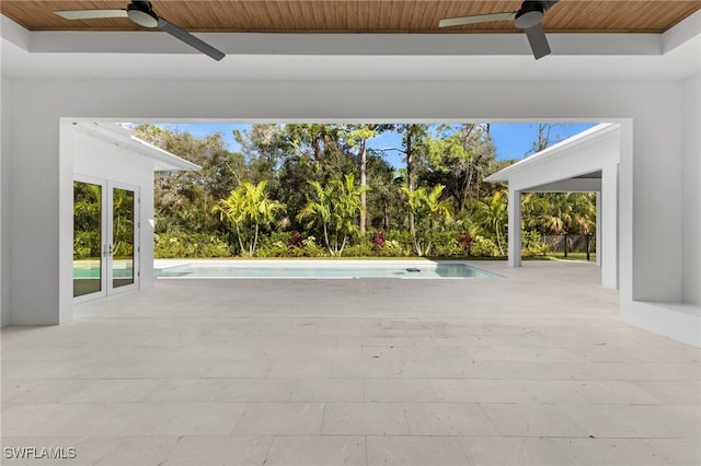 view of patio with ceiling fan and french doors