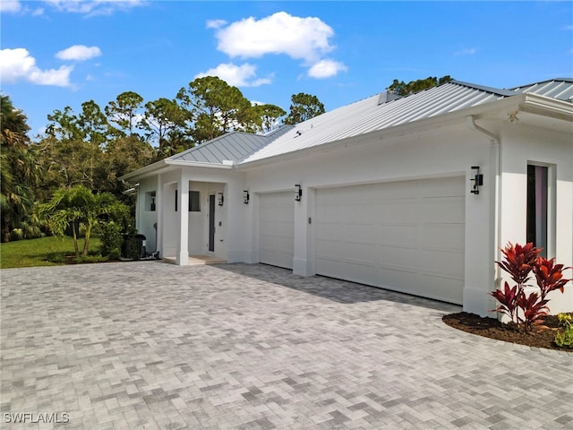 exterior space with a garage