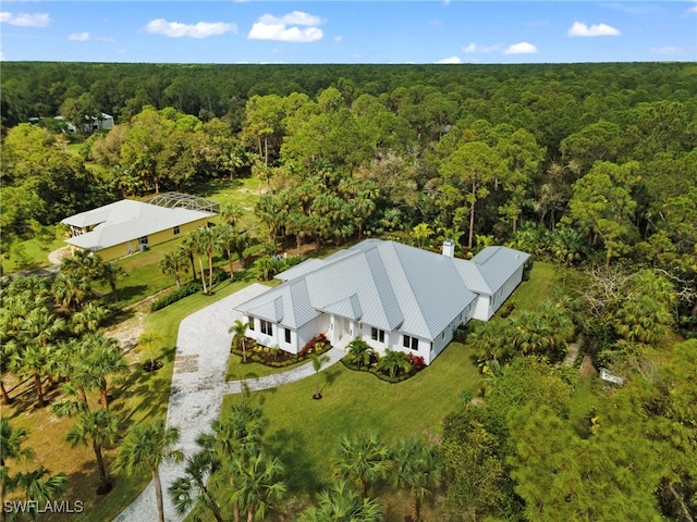 3509 5th Ave SW, Naples, FL 34117 - view from above of property featuring a forest