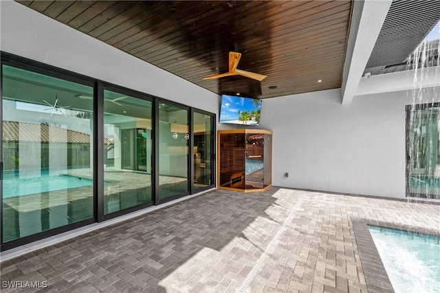 view of patio / terrace featuring ceiling fan