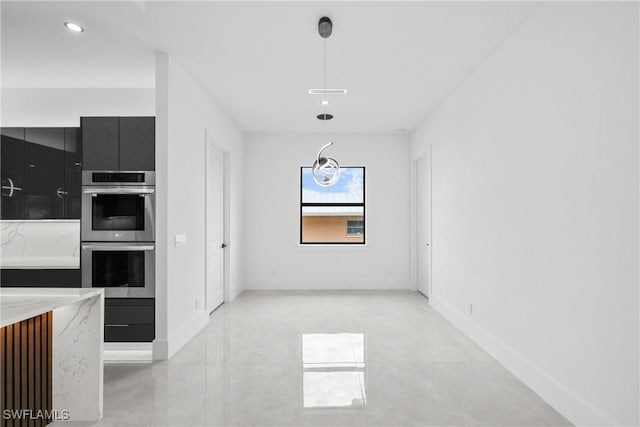 kitchen with pendant lighting and double oven