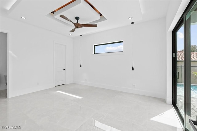 unfurnished room with ceiling fan