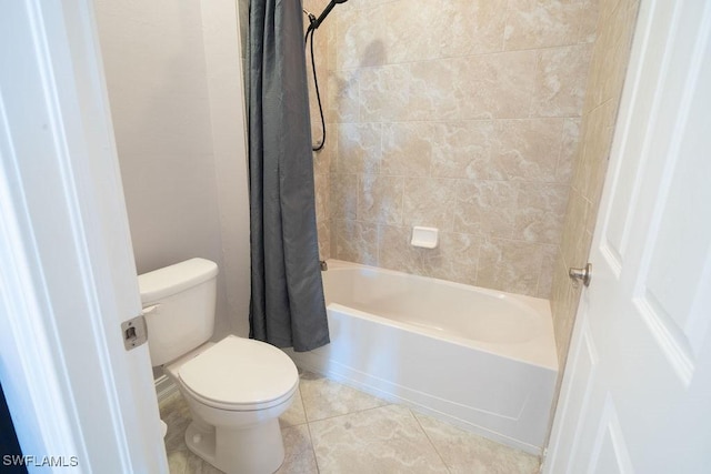 bathroom with toilet, tile patterned floors, and shower / tub combo with curtain