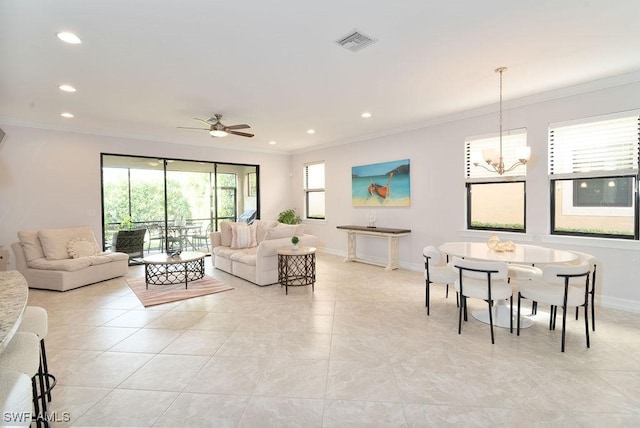 living room with ceiling fan with notable chandelier and ornamental molding