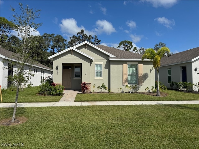 view of front of home featuring a front lawn