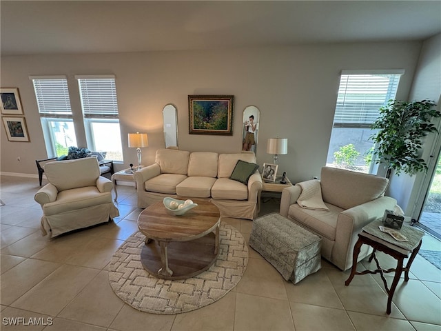 tiled living room featuring a wealth of natural light