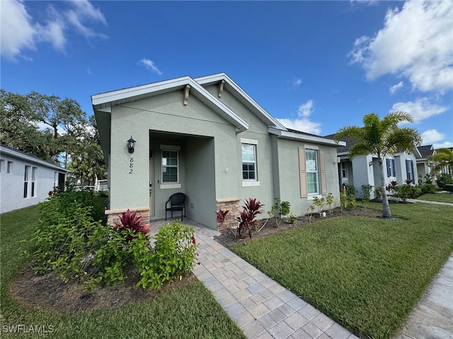 view of front of home with a front yard