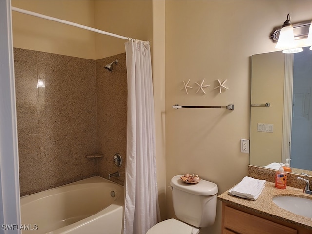 full bathroom featuring shower / bath combo with shower curtain, vanity, and toilet