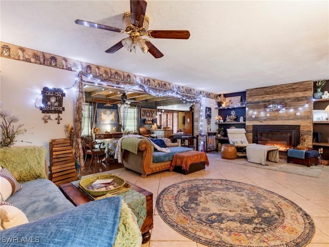 tiled living room featuring ceiling fan