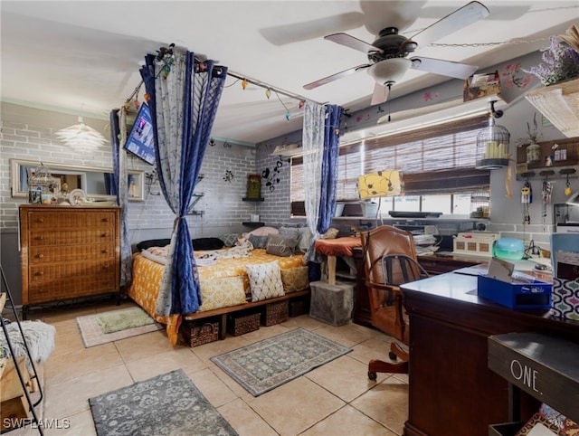 bedroom featuring ceiling fan, brick wall, and light tile patterned floors