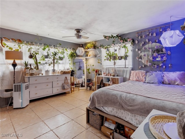 tiled bedroom with ceiling fan