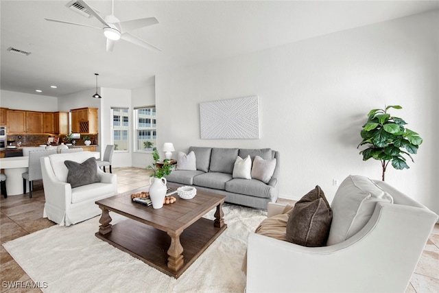 living room featuring ceiling fan