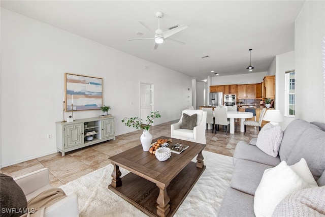 living room featuring ceiling fan