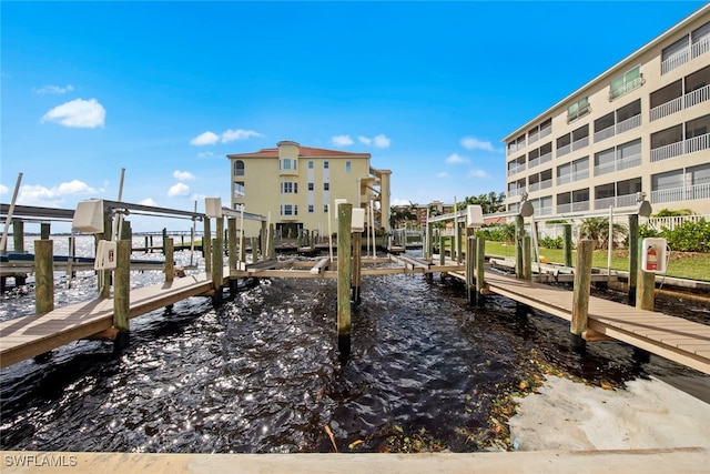 dock area with a water view