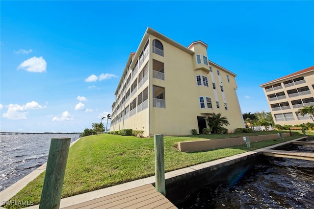 view of building exterior featuring a water view