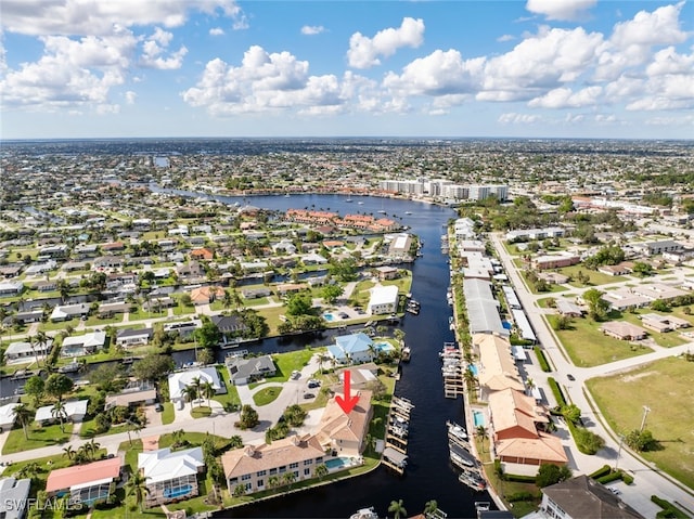 bird's eye view with a water view