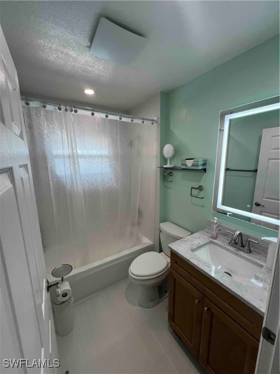 full bathroom featuring toilet, shower / tub combo, vanity, and a textured ceiling