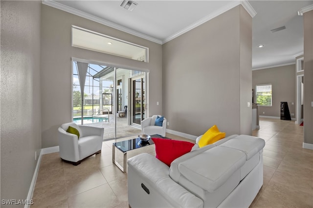 living room featuring light tile patterned floors and ornamental molding