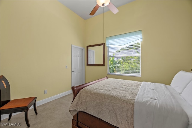 bedroom with light carpet and ceiling fan