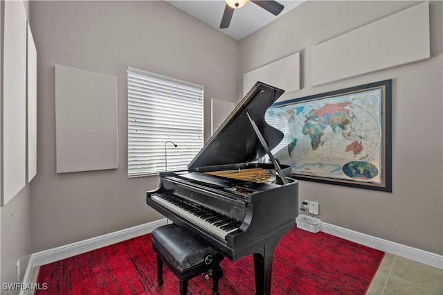 misc room featuring ceiling fan and tile patterned floors