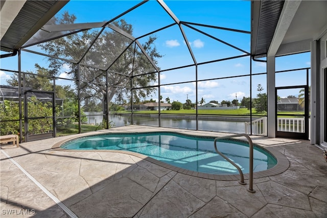 view of pool with a lanai, a water view, and a patio