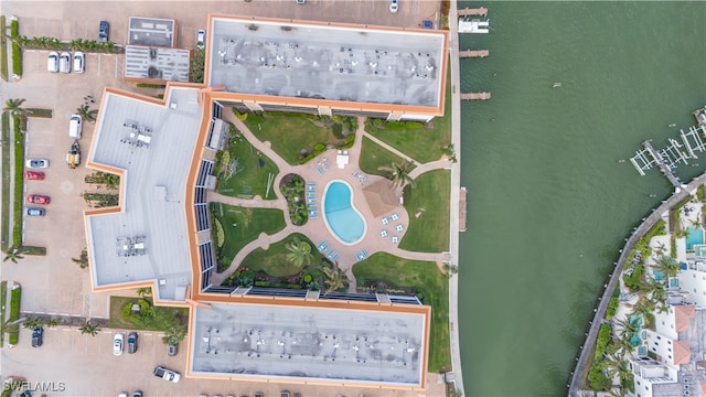 birds eye view of property featuring a water view