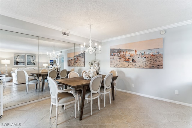 dining space with a textured ceiling, an inviting chandelier, crown molding, and light tile patterned flooring