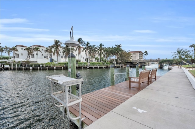 view of dock with a water view