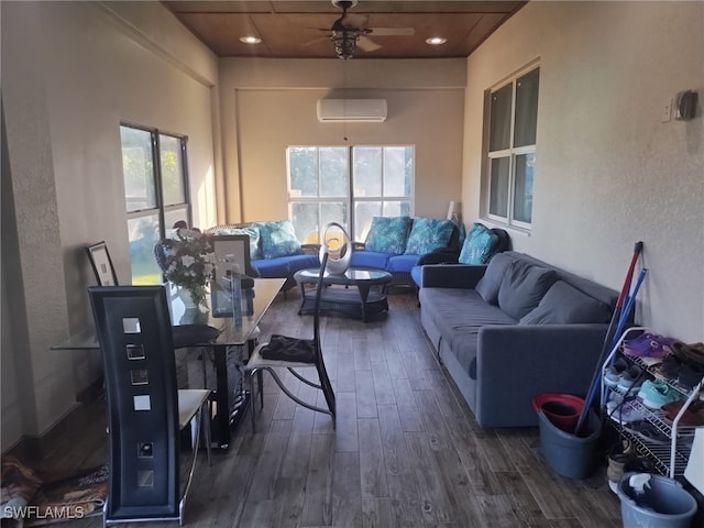 interior space with ceiling fan, dark hardwood / wood-style flooring, a wealth of natural light, and a wall mounted AC