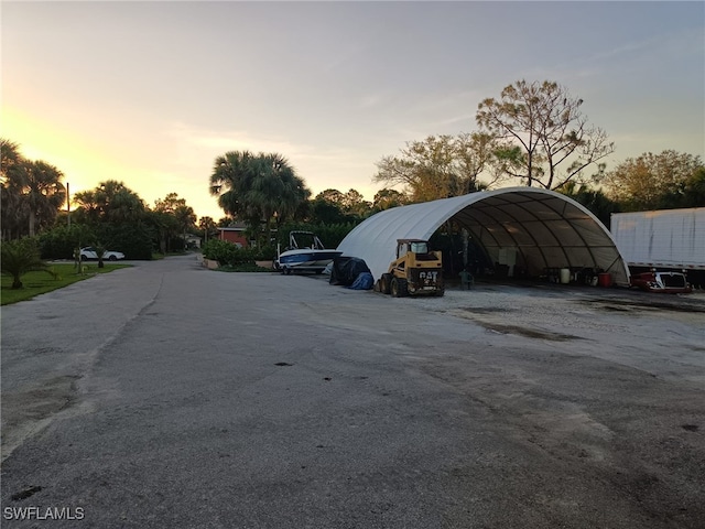 parking at dusk with a carport